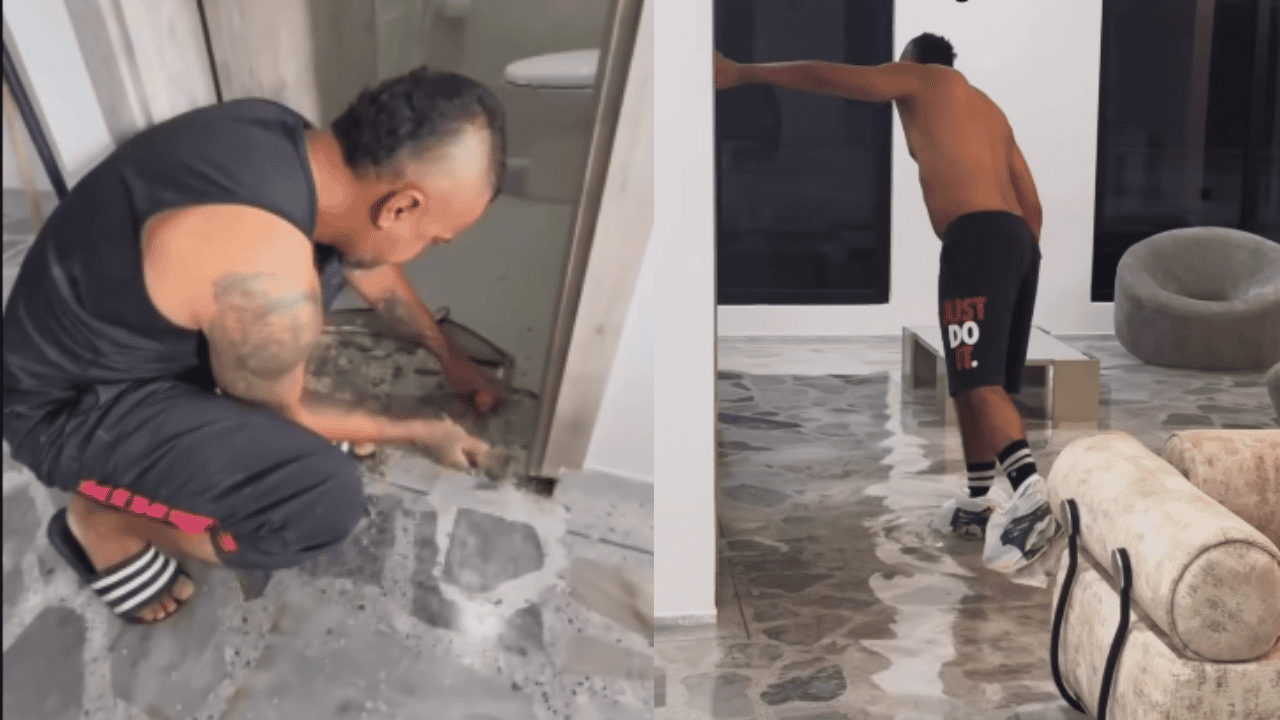 Jhon Álex Castaño, cantante de despecho colombiano, haciendo reparaciones locativas en su casa.